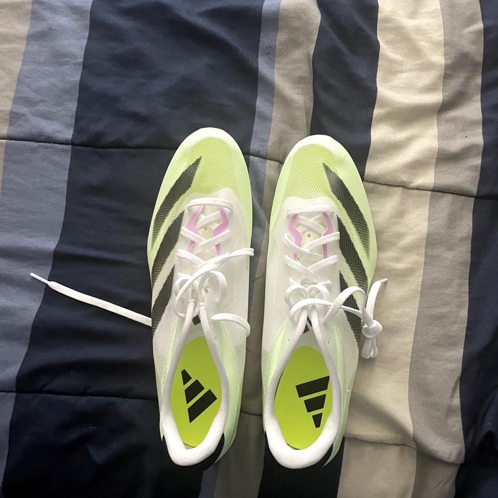 Adidas White and Lime Green Athletic Cleats